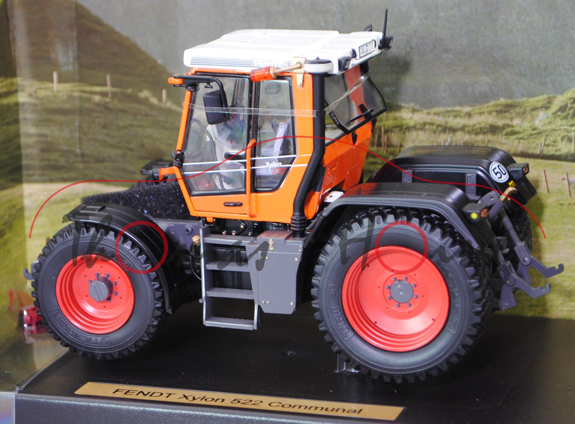 FENDT XYLON 522 (1. Generation, Modell 1994-2004) Kommunal, orange